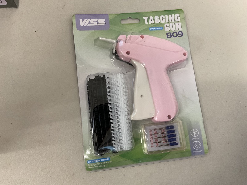 Photo 1 of HAYVAN Stitch Gun for Clothes, Pink Speedy Clothing Fixer Stitchy, Versatile Mini Tagging Gun, New Hemming Sewing Tool Kit with 6 Needles, 500 Black & 500 White Mini Fasteners