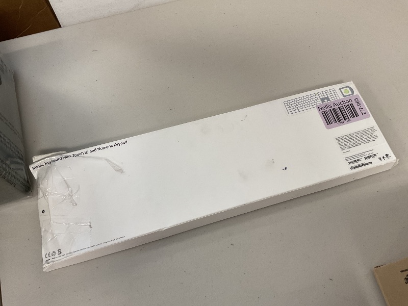 Photo 1 of Apple Magic Keyboard with Touch ID and Numeric Keypad: Wireless, Bluetooth, Rechargeable. Works with Mac Computers with Apple Silicon; US English - White Keys