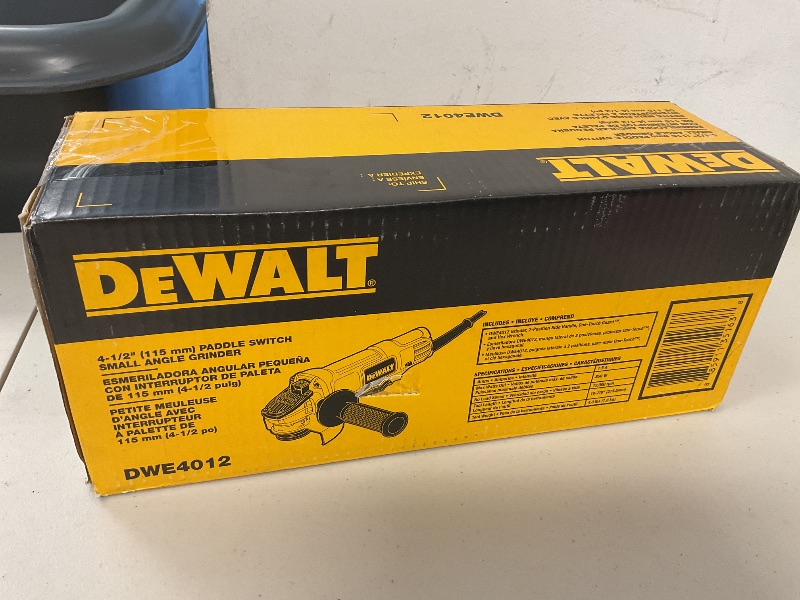 Photo 1 of DEWALT Angle Grinder Tool, 4-1/2-Inch, Paddle Switch, 7-Amp (DWE4012)