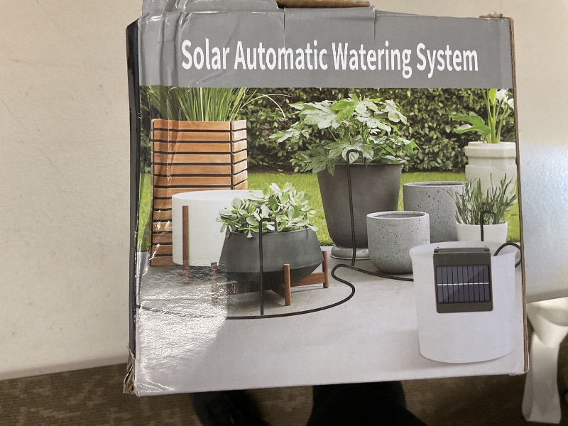 Photo 1 of Wesapor Auto Watering System for Vacation - Solar Drip Irrigation Kit with 30-Day Timer, Leakproof Tubing & Silent Alarm, DIY Indoor/Outdoor Plant Care Solution up to 15 Pots