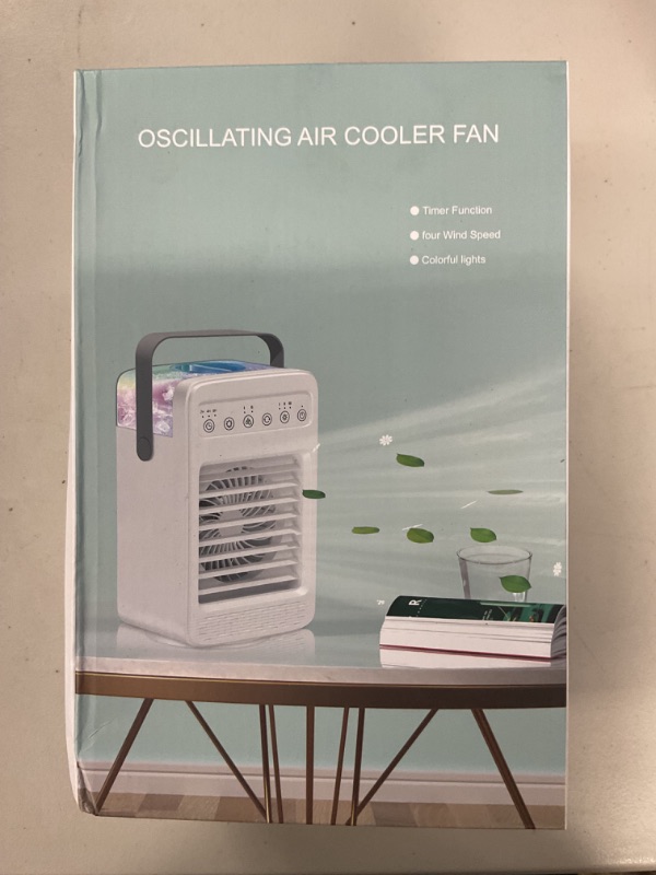 Photo 1 of Portable Air Conditioners Fan, Mini Air Conditioner with 2 Ice Packs, 3 Speed Anti-leakage Water Personal Ice Air Cooler for Room Desk Office Home Tent 