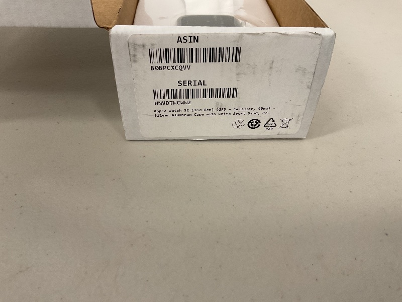 Photo 1 of Apple Watch SE (2nd Gen) (GPS + Cellular, 40mm) - Silver Aluminum Case with White Sport Band, M/L (Renewed)