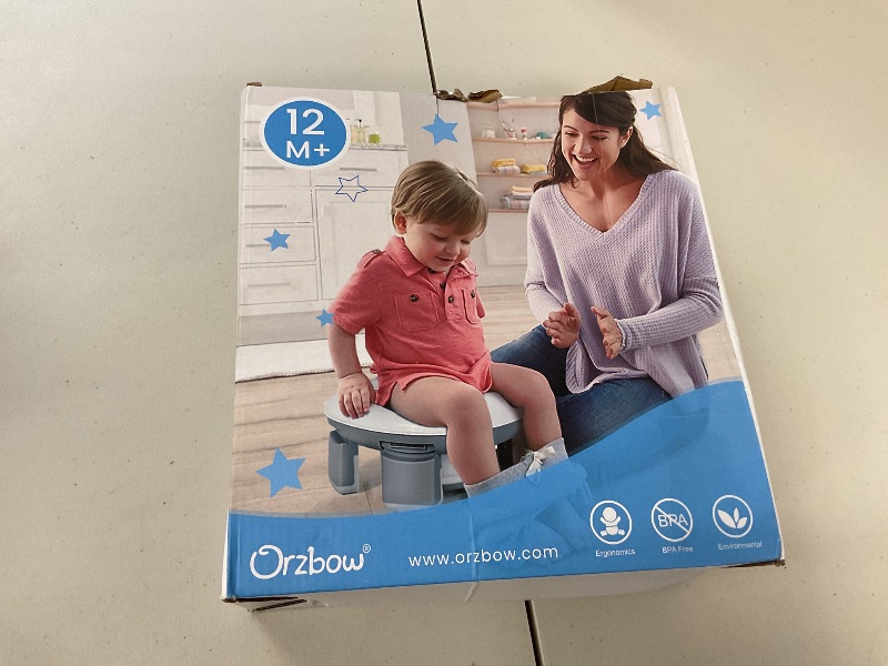 Photo 1 of Orzbow Portable Potty Training Toilet for Boys and Girls with Storage Bag - Foldable Travel Potty Chair, Toddler Potty Seat for Indoor and Outdoor, Easy to Clean, Includes Free 40pcs Travel Bags, Gray