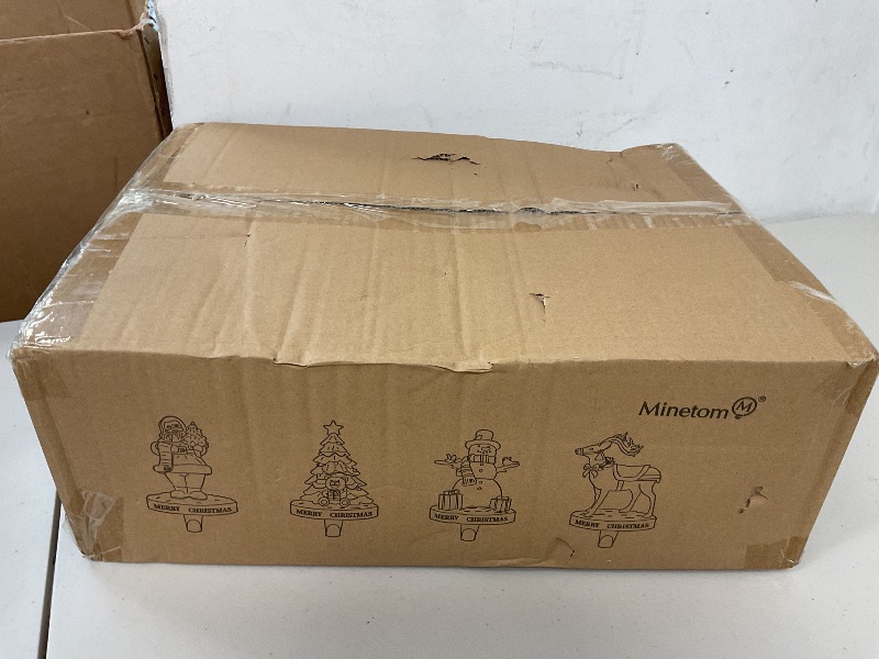 Photo 1 of Minetom Christmas Stocking Holders for Mantle Set of 4, 3D Resin Tree Reindeer Snowman and Santa Claus Stocking Hangers, Home Xmas Decorations for Fireplace Mantel Table Garland