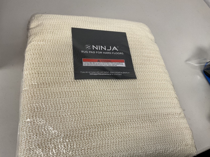 Photo 1 of Ninja Rug Gripper Pad for Hardwood Floors, 8x10 FT, Slip Resistant Grip Pads for Hard Surfaces, Adds Cushion Under Carpet and Maximum Protection, Keeps Area Rugs and Carpets Safe and in Place on Floor