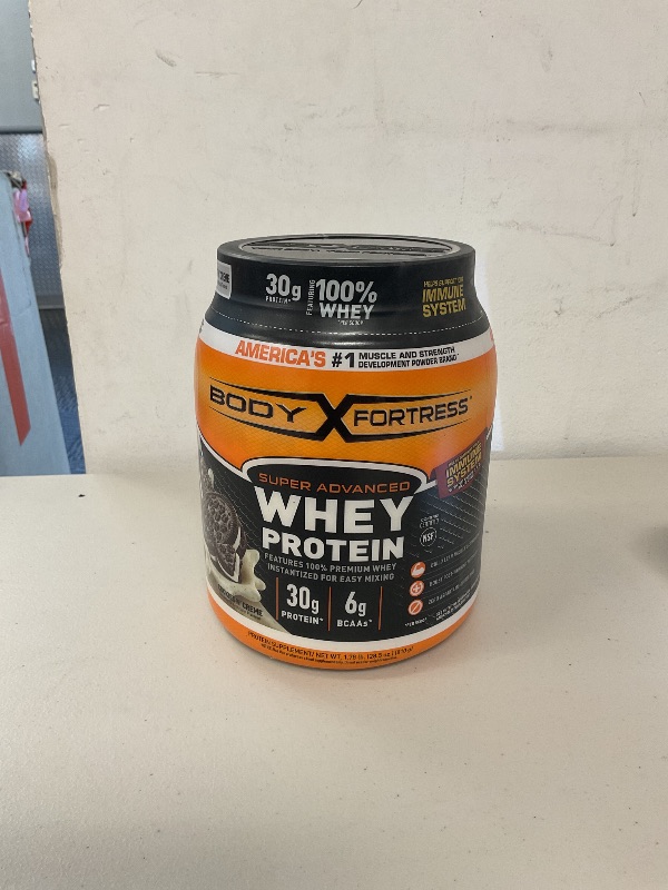 Photo 1 of Body Fortress Super Advanced Whey Protein Powder, Cookies N’ Creme, 60g Protein & 12g BCAAs Per 2 Scoops, Muscle Gain & Recovery, Immune Support with Vitamins C & D, 1.78lbs (Packaging May Vary)