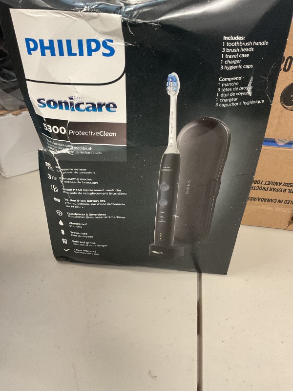 Photo 1 of Philips Sonicare ProtectiveClean 5300 Rechargeable Electric Toothbrush, with Pressure Sensor, 3 Cleaning Modes, SmarTimer and QuadPacer, with 2 Bonus Brush Heads, Travel Case, Black, Model HX6423/34