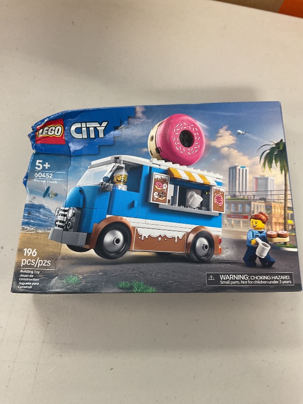 Photo 1 of LEGO City Donut Truck Toy - Building Toy for Kids, Boys and Girls, Ages 5+ - Birthday Gift for Kids Mobile Donut Stand with 2 Minifigures and Other Accessories - 60452