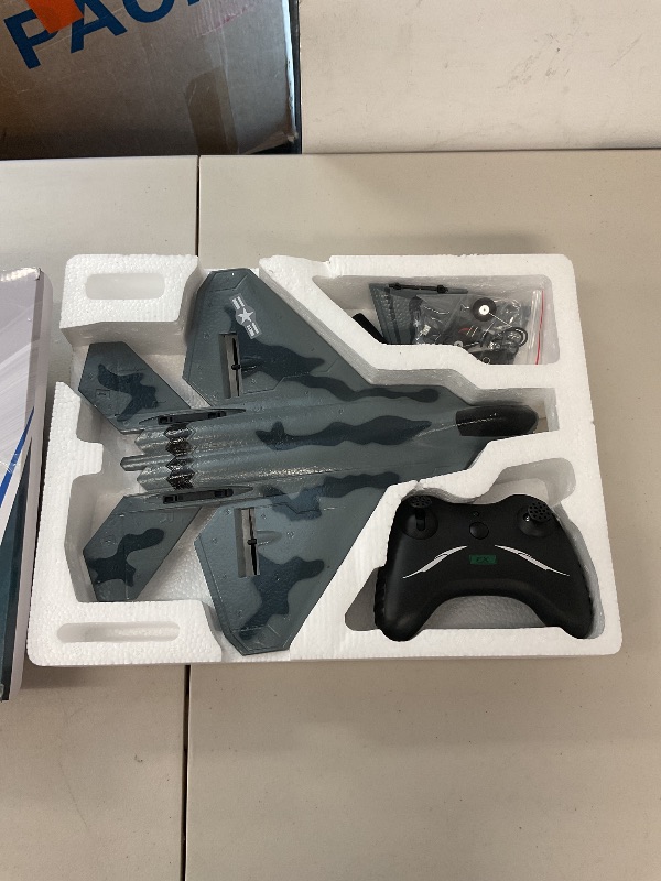 Photo 1 of HAWK'S WORK 2 CH RC Airplane, F-22 Plane Ready to Fly, 2.4GHz Remote Control, Easy to Fly RC Glider for Kids & Beginners