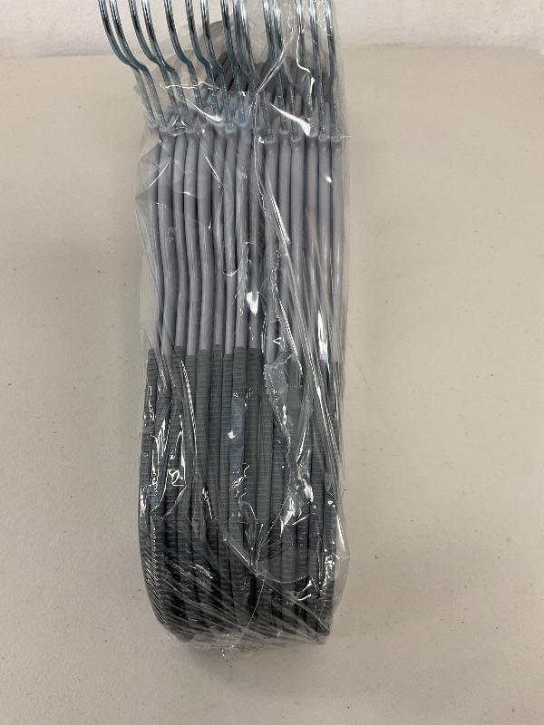 Photo 1 of Grey hangers 15 pieces 