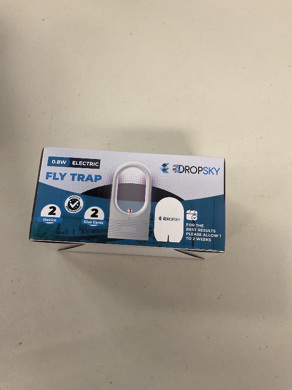 Photo 1 of Dropsky Indoor Flying Insect Trap - Plug-in Bug Light Trap for Fruit Flies, Gnats and Houseflies - Odorless and Mess Free (2 Traps + 2 Glue Cards)