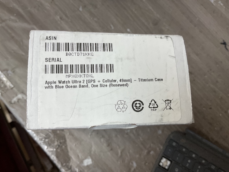 Photo 1 of Apple Watch Ultra 2 [GPS + Cellular, 49mm] - Titanium Case with Blue Ocean Band, One Size (Renewed)