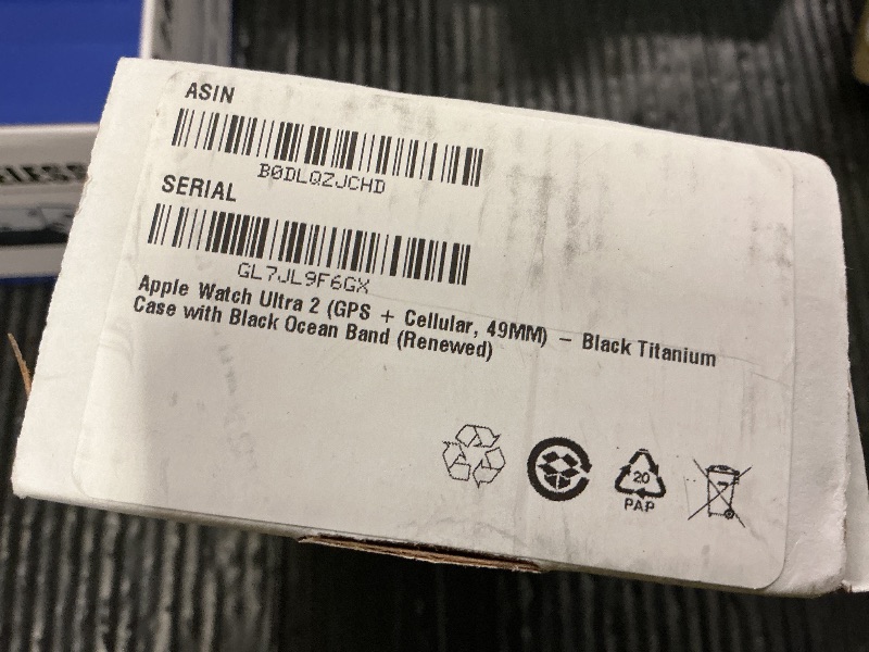 Photo 1 of Apple Watch Ultra 2 (GPS + Cellular, 49MM) - Black Titanium Case with Black Ocean Band (Renewed)