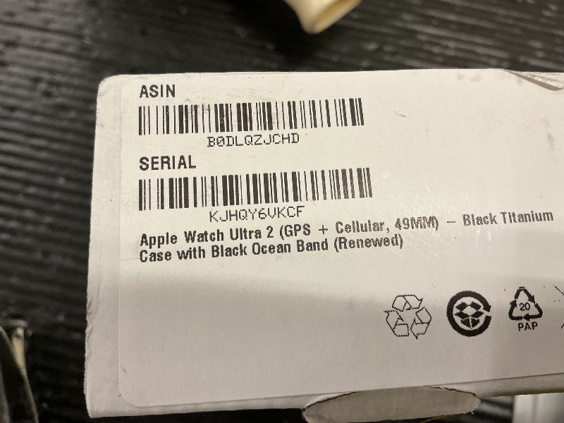 Photo 1 of Apple Watch Ultra 2 (GPS + Cellular, 49MM) - Black Titanium Case with Black Ocean Band (Renewed)