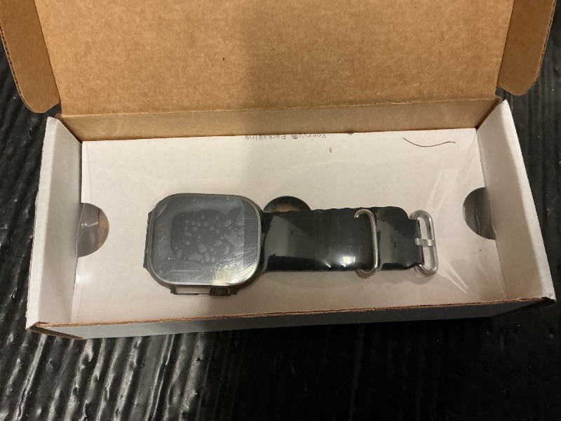 Photo 1 of Apple Watch Ultra 2 (GPS + Cellular, 49MM) - Black Titanium Case with Black Ocean Band (Renewed)