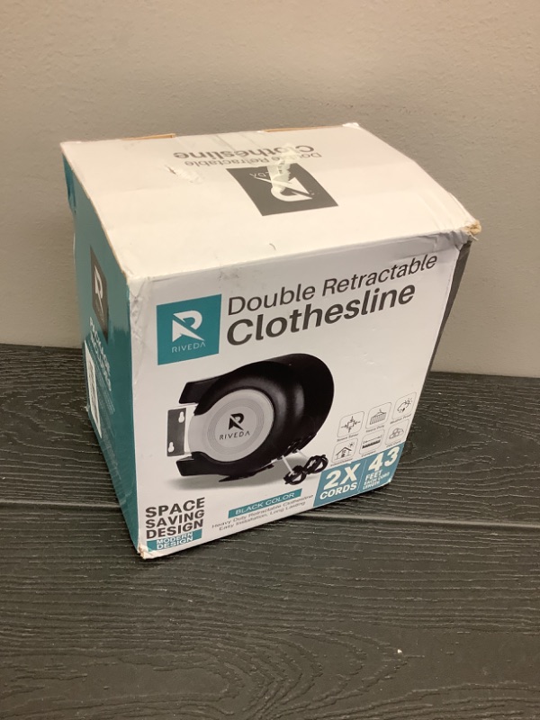 Photo 1 of RIVEDA Dual Retractable Clothesline 43 ft Each Line with 24 Clothes Pins - Heavy Duty Clothes Line Indoor & Outdoor Laundry Line -Double Clothing line - Easy Installation (Black)