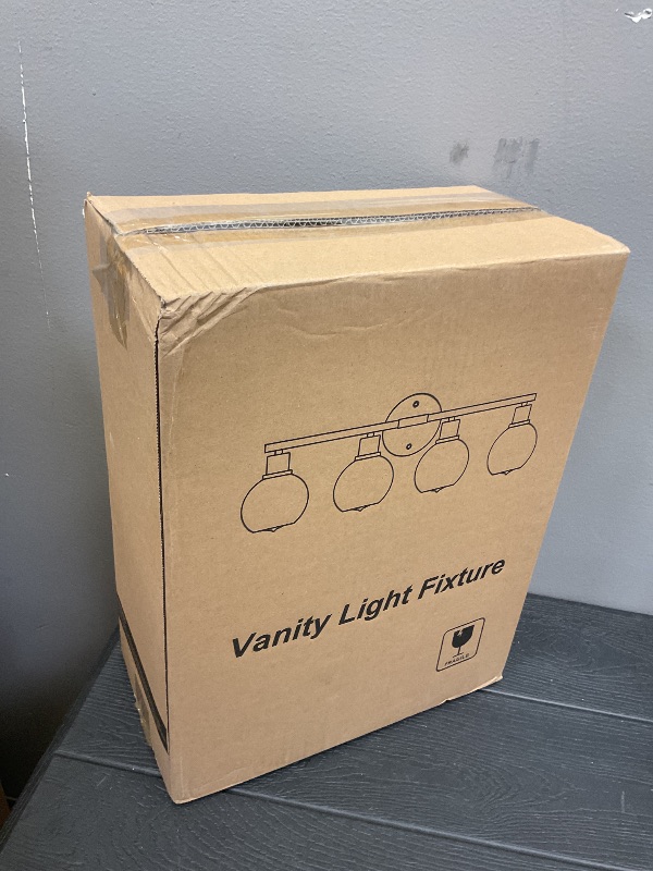 Photo 1 of 2025 Upgrade 4-Light Bathroom Light Fixtures, Black Bathroom Lights Over Mirror with Clear Glass Globe Shade, Vanity Lights for Bathroom Kitchen Living Room Hallway Cabinet Bedroom Porch