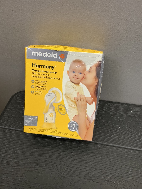 Photo 1 of Medela Harmony Manual Breast Pump, Compact Swiss Design with PersonalFit Flex Shields and Medela's 2-Phase Expression Technology