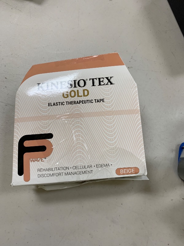 Photo 1 of Kinesio Taping - Elastic Therapeutic Athletic Tape Tex Gold FP - Bulk Roll - Beige – 2 in. x 103 ft