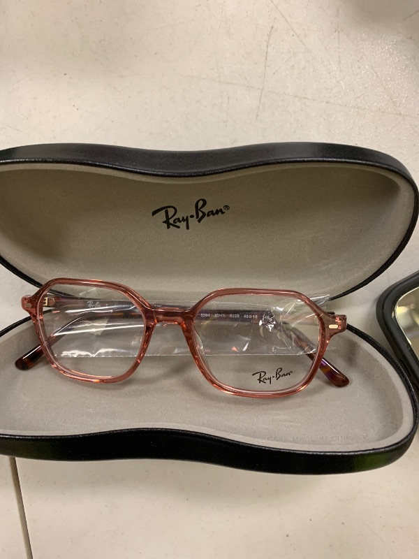 Photo 1 of Ray-Ban Unisex RX5394 John Square Prescription Eyewear Frames, Transparent Pink/Demo Lens, 49 mm