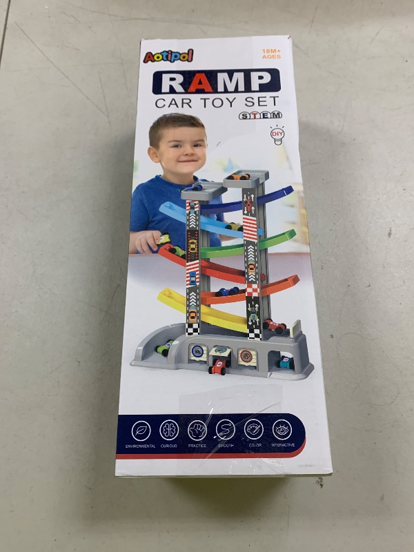 Photo 1 of Montessori Toys for 2 3 Year Old Boys Toddlers, Car Ramp Toys with 6 Cars & Race Tracks, Garages and Parking Lots, Ramp Racer Toy Gift for Boys Girls Age 18 Months and Up, Multicolor