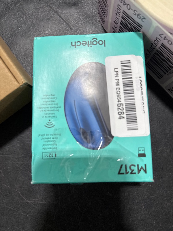 Photo 1 of Logitech M317 Wireless Mouse, 2.4 GHz with USB Receiver, 1000 DPI Optical Tracking, 12 Month Battery, Compatible with PC, Mac, Laptop, Chromebook - Blue
