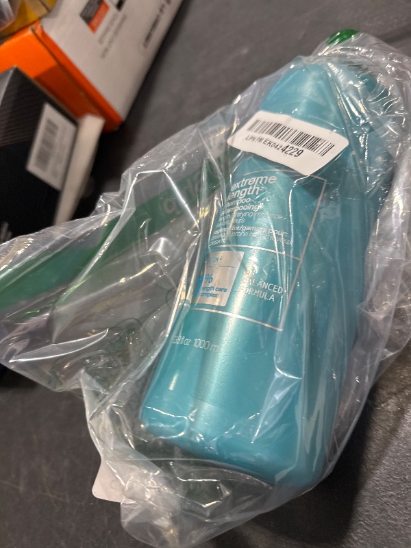 Photo 1 of Redken Extreme Length Shampoo For Damaged Hair - Prevents Breakage and Strengthens Hair, Infused With Biotin For Hair Growth, 33.8 Fl Oz