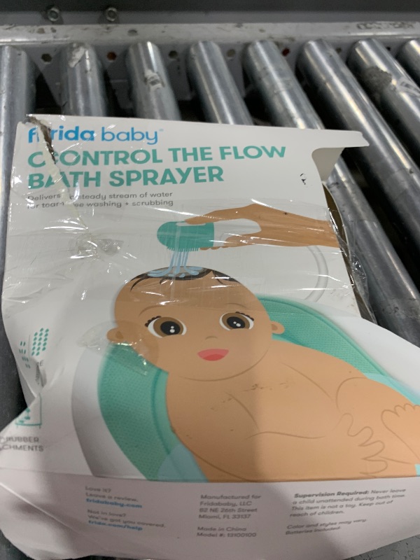 Photo 1 of Frida Baby Control The Flow Bathtub Sprayer Attachment for Baby Bathtub, Shower Head with Scalp Massager, Control Waterflow with 2 Pressure Modes