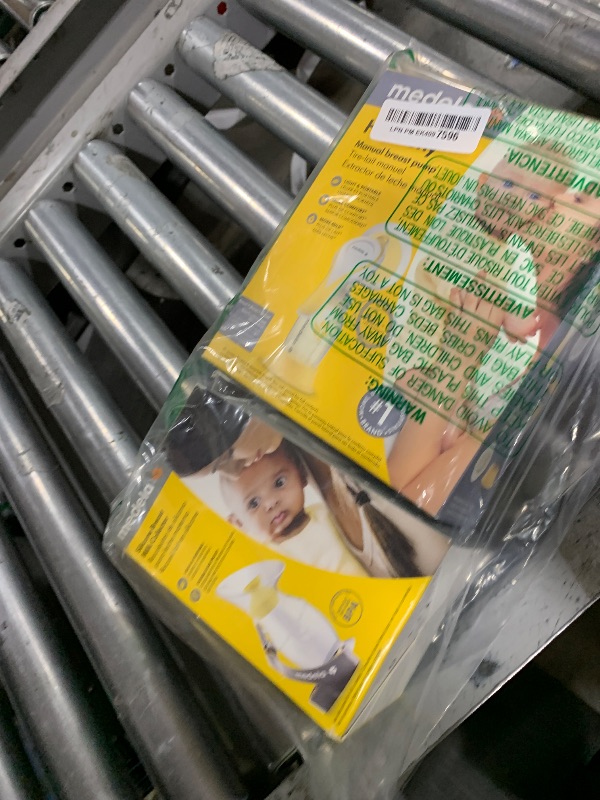 Photo 1 of Medela Silicone Breast Milk Collector, Milk Saver with Spill-Resistant Stopper, Suction Base and Lanyard, 3.4 oz/100 mL