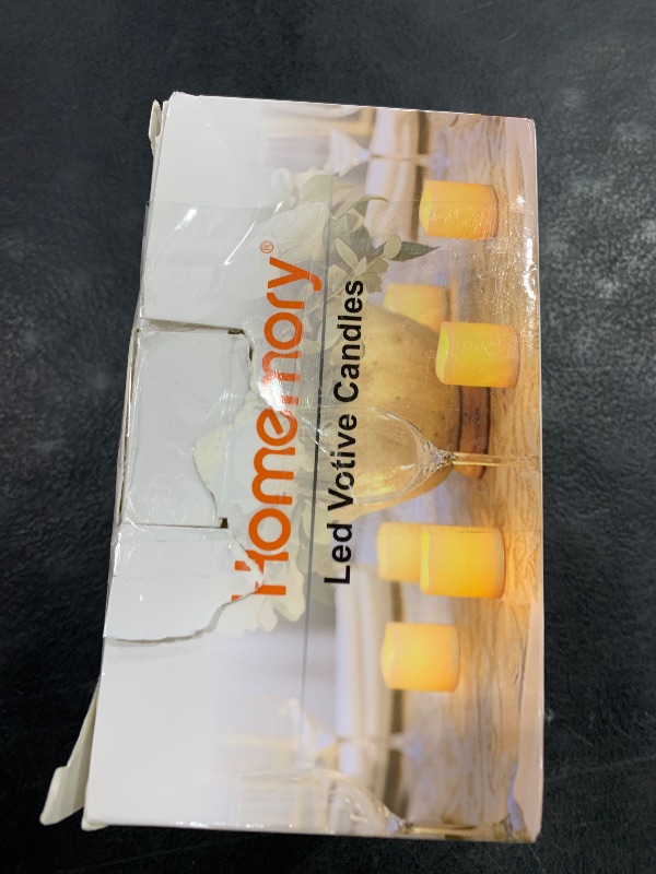 Photo 1 of Homemory 24Pack Flickering Flameless Votive Candles,200+Hour Electric Fake Candles,Battery Operated LED Tealight for Wedding,Outdoor,Table,Halloween,Christmas Decor(Warm White,Battery Included)
