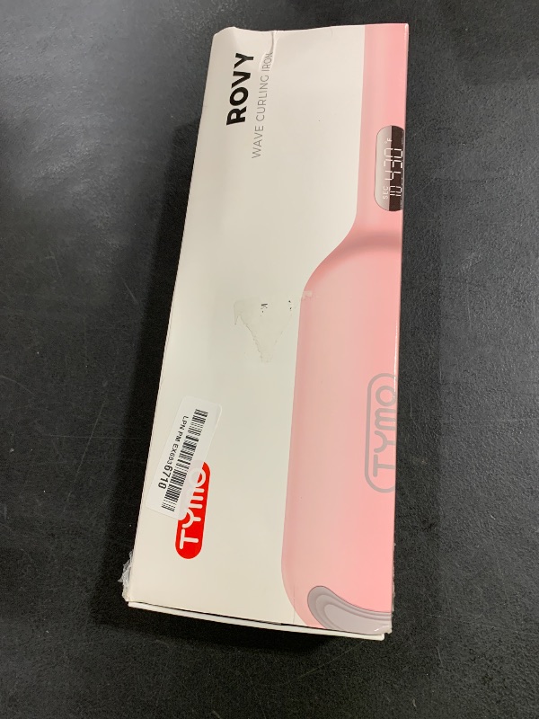 Photo 1 of rovy curling iron 