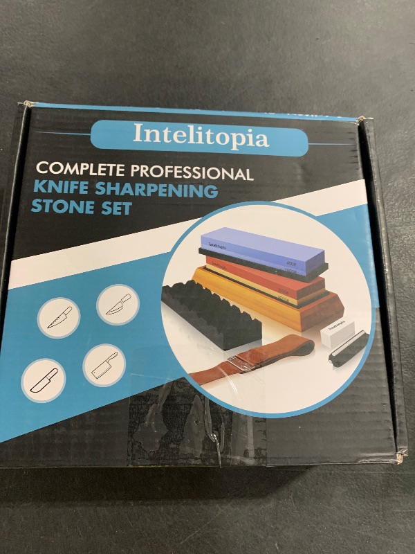 Photo 1 of Intelitopia Complete Knife Sharpening Stone Set – Dual Grit Whetstone 400/1000 3000/8000 Knife Sharpener with Leather Strop, Flattening Stone, Bamboo Base, 3 Non-slip Rubber Bases & Angle Guide