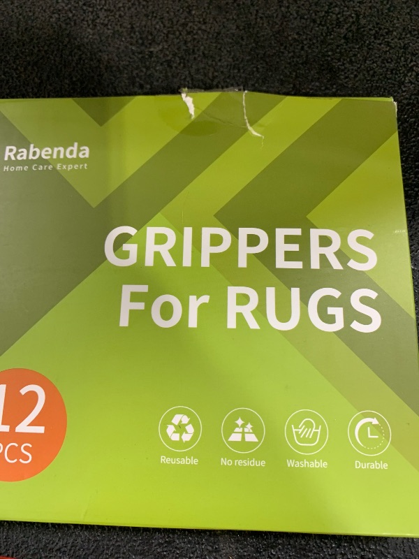 Photo 1 of Rabenda 12 Pcs Rug Tape, Non Slip Rug Pads Grippers for Hardwood Floors and Tiles, Reusable Carpet Tape for Area Rugs, Double-Sided Adhesive Rug Stickers Keep Corners Flat (Black)