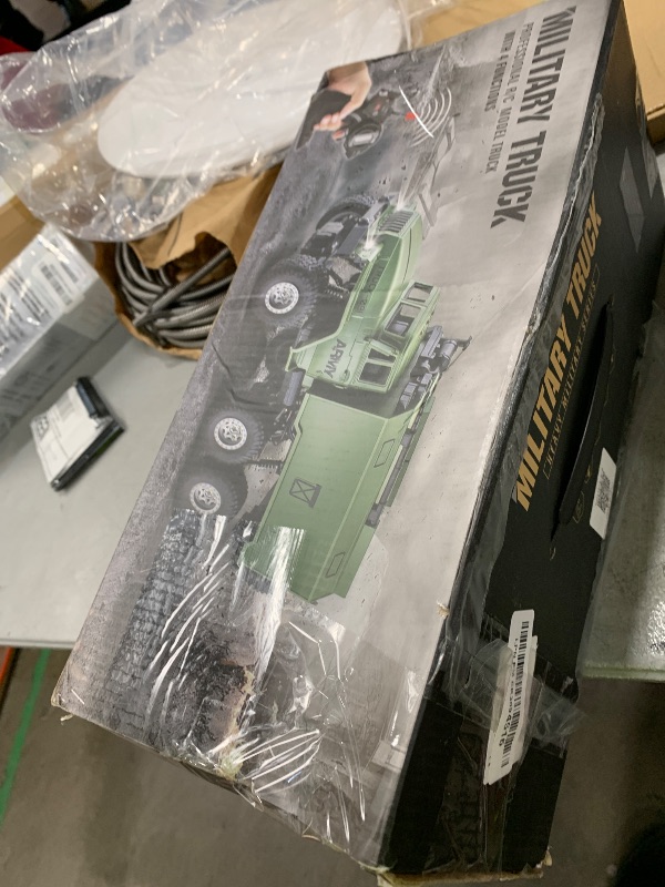 Photo 1 of GoolRC RC Military Truck, 1:16 Scale 6WD Remote Control Car, Off-Road RC Crawler, RC Army Cars with LED Light and 2 Batteries, All Terrain RC Military Carrier Truck for Kids and Adults