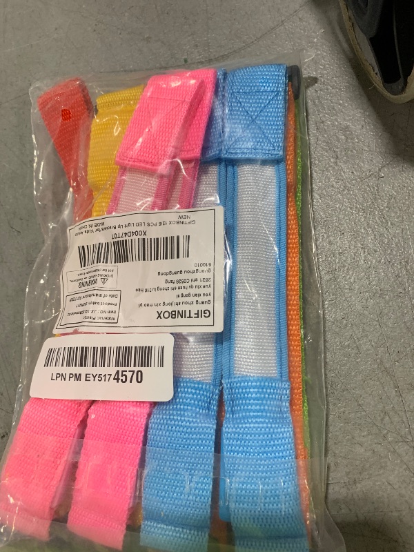 Photo 1 of GIFTINBOX 12/6 PCS LED Light Up Bracelets for Kids Adults, LED Glow Flashing Arm Wrist Bands, Glow in The Dark Party Supplies for Night Events, Festivals. Party Favors For Concerts Rave Sports