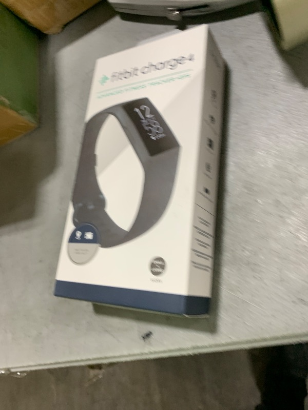 Photo 1 of Fitbit Charge 4 Black Advanced Fitness Tracker