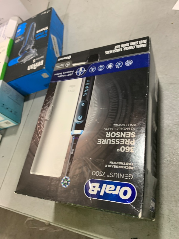 Photo 1 of Oral-B 7500 Electric Toothbrush with Replacement Brush Heads and Travel Case, Black