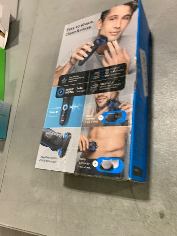 Photo 1 of Braun Electric Shaver for Men, Series 5 5150cs, Wet & Dry Shave, Turbo Shaving Mode, Foil Shaver, with Beard Trimmer, Body Groomer and Charging Stand, Blue