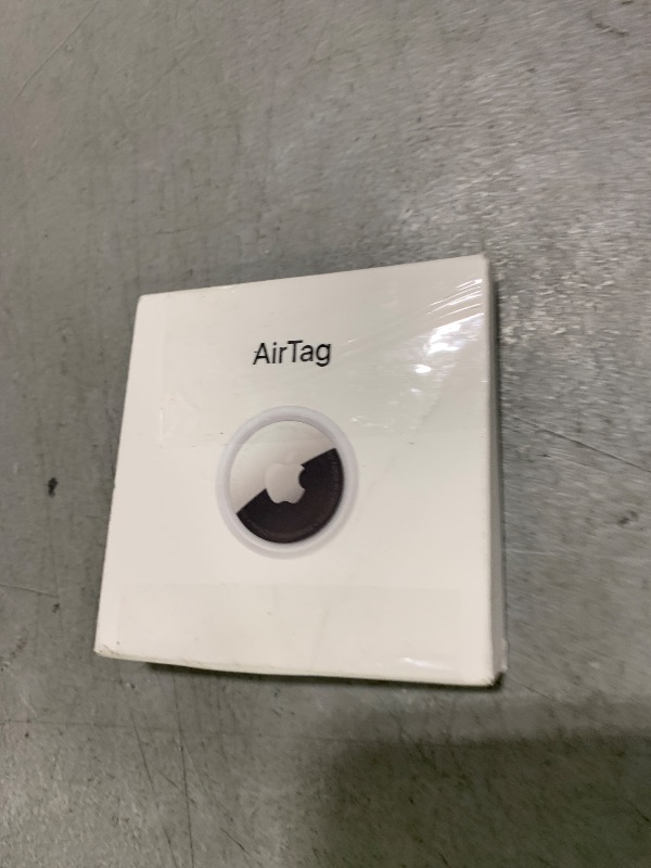 Photo 1 of Apple AirTag. Keep Track of and find Your Keys, Wallet, Luggage, Backpack, and More. Simple one-tap Set up with iPhone or iPad
