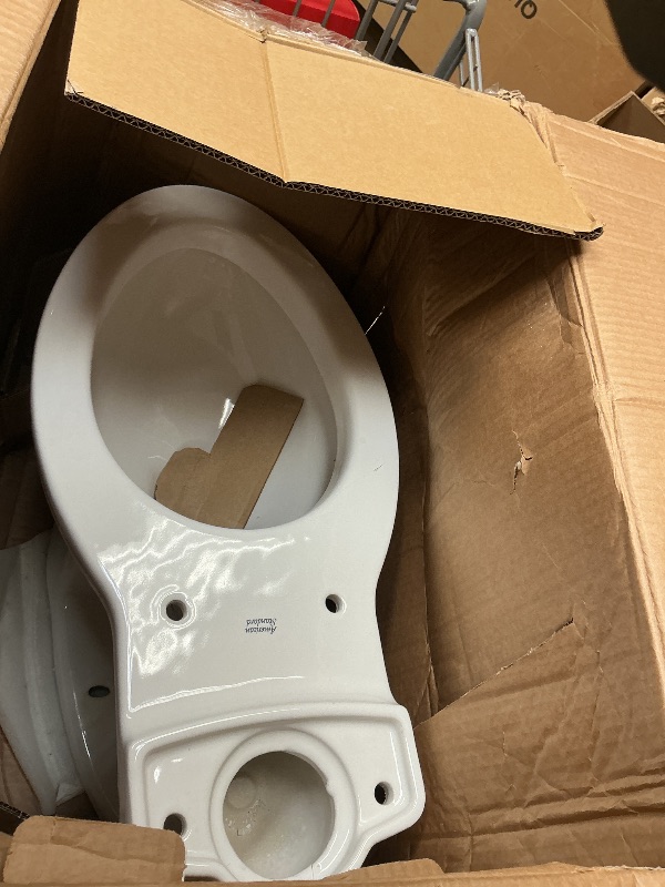 Photo 1 of American Standard 609CA001.020 Cadet PRO Two-Piece Toilet with Slow-Close Seat and Wax Ring, Elongated Front, Standard Height, White, 1.28 gpf