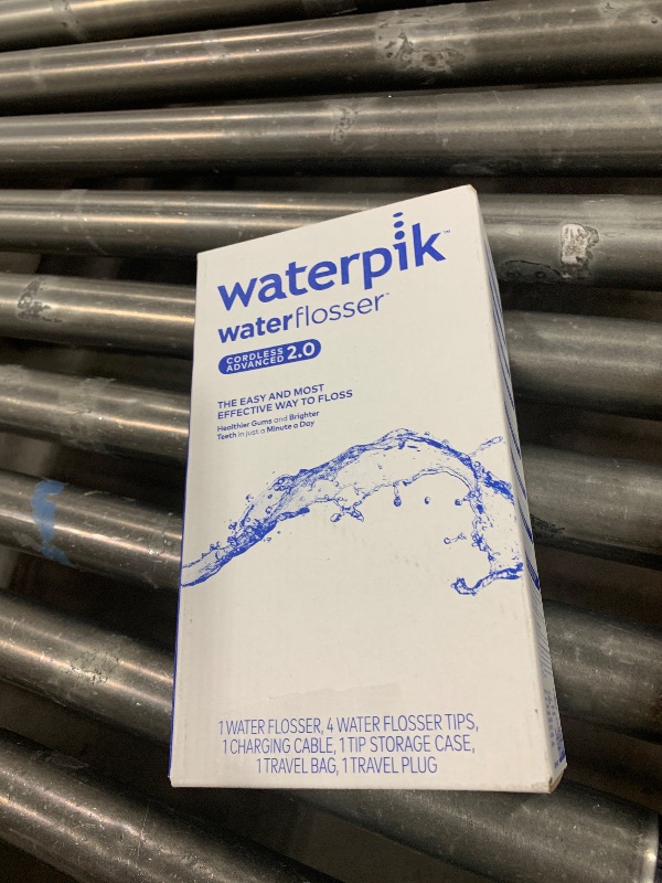 Photo 1 of Waterpik Cordless Advanced 2.0 Water Flosser For Teeth, Gums, Braces, Dental Care With Travel Bag and 4 Tips, ADA Accepted, Rechargeable, Portable, and Waterproof, Black WP-582, Packaging May Vary