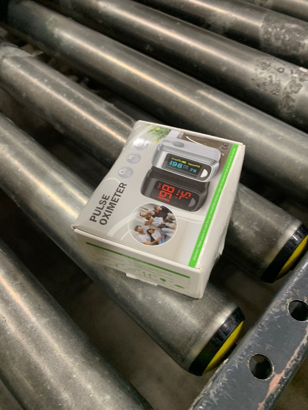 Photo 1 of Fingertip Pulse Oximeter Blood Oxygen Monitor Pulse Ox, Heart Rate and Fast Spo2 Reading Oxygen Meter with OLED Screen Included Batteries and Lanyard
