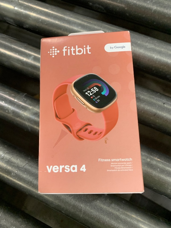 Photo 1 of Fitbit Versa 4 Fitness Smartwatch with Daily Readiness, GPS, 24/7 Heart Rate, 40+ Exercise Modes, Sleep Tracking and more, Pink Sand/Copper Rose, One Size (S & L Bands Included)