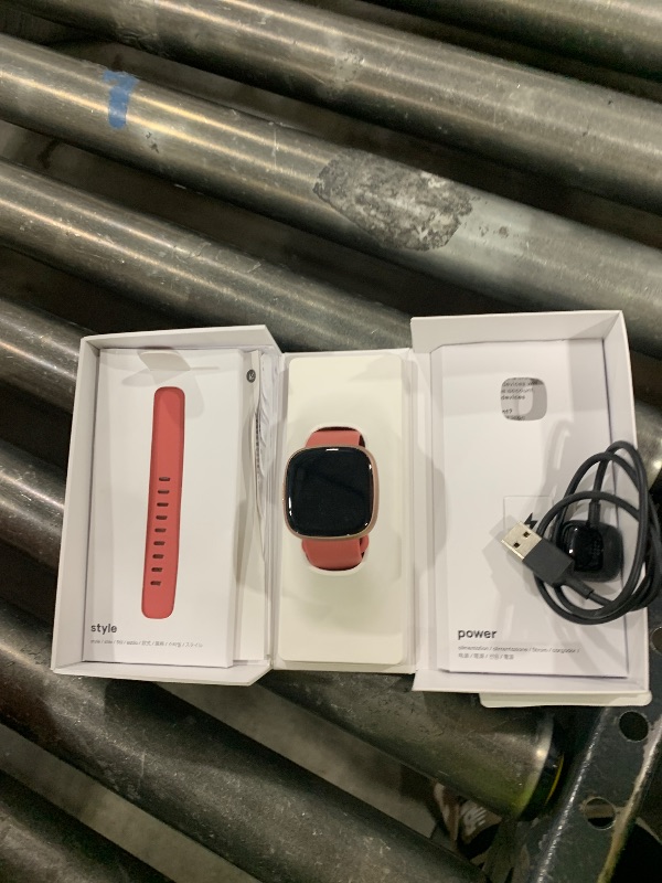 Photo 1 of Fitbit Versa 4 Fitness Smartwatch with Daily Readiness, GPS, 24/7 Heart Rate, 40+ Exercise Modes, Sleep Tracking and more, Pink Sand/Copper Rose, One Size (S & L Bands Included)
