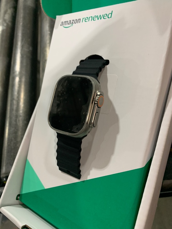 Photo 1 of Apple Watch Ultra [GPS + Cellular 49mm] Titanium Case with Midnight Ocean Band, One Size (Renewed Premium)
