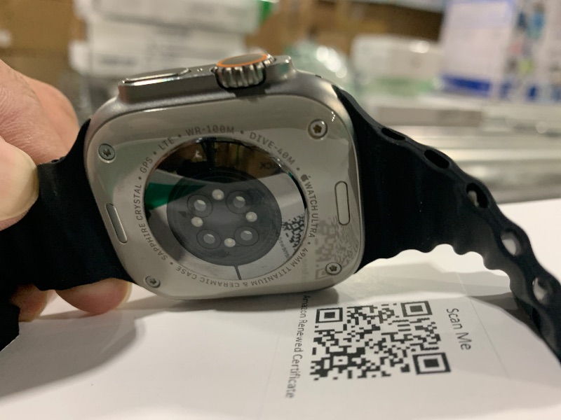 Photo 1 of Apple Watch Ultra [GPS + Cellular 49mm] Titanium Case with Midnight Ocean Band, One Size (Renewed Premium)