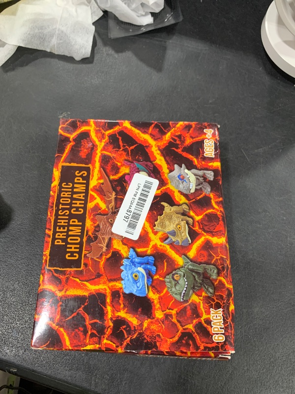 Photo 1 of DR DINGUS Jurassic Dinosaur Chomp Champs - 6 Pack - Educational Gift Packaging - Mini Toy Squad Dino Figures - Jaws Snap and Tails Way - Fun for Children and Families