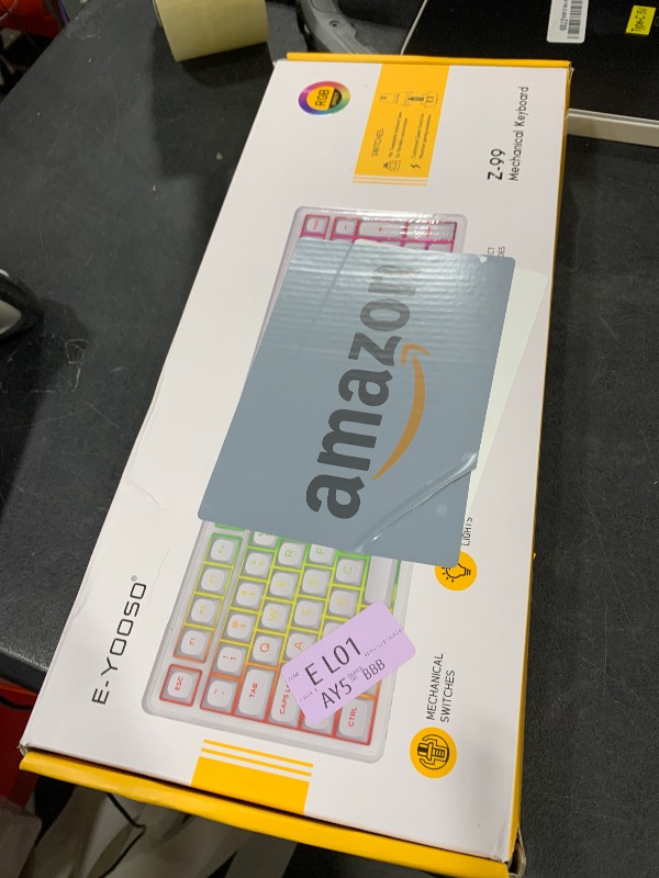 Photo 1 of E-YOOSO Mechanical Gaming Keyboard, Wired 75% Mechanical Keyboard with Blue Switches, 87 Keys Gaming Keyboard with Solid Color Backlit & RGB LED Sidelight for Windows Mac PC Gaming