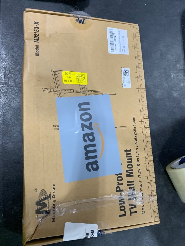 Photo 1 of Mounting Dream TV Mount Fixed for Most 42-84 Inch Flat Screen TVs, TV Wall Mount Bracket up to VESA 600 x 400mm and 132 lbs - Fits 16"/18"/24" Studs - Low Profile and Space Saving MD2163-K