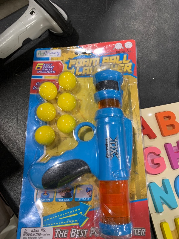 Photo 1 of ArtCreativity Foam Ball Launcher with 6 Balls, Pump Action Shooting Toy Blaster for Kids, Outdoor Summer Fun, Fetch Toy for Dogs, Best Holiday or Birthday Gift for Boys and Girls